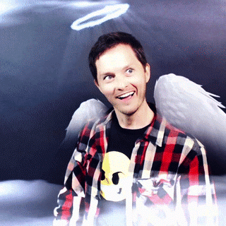 An augmented reality photo booth GIF of a guest with angel wings and a halo